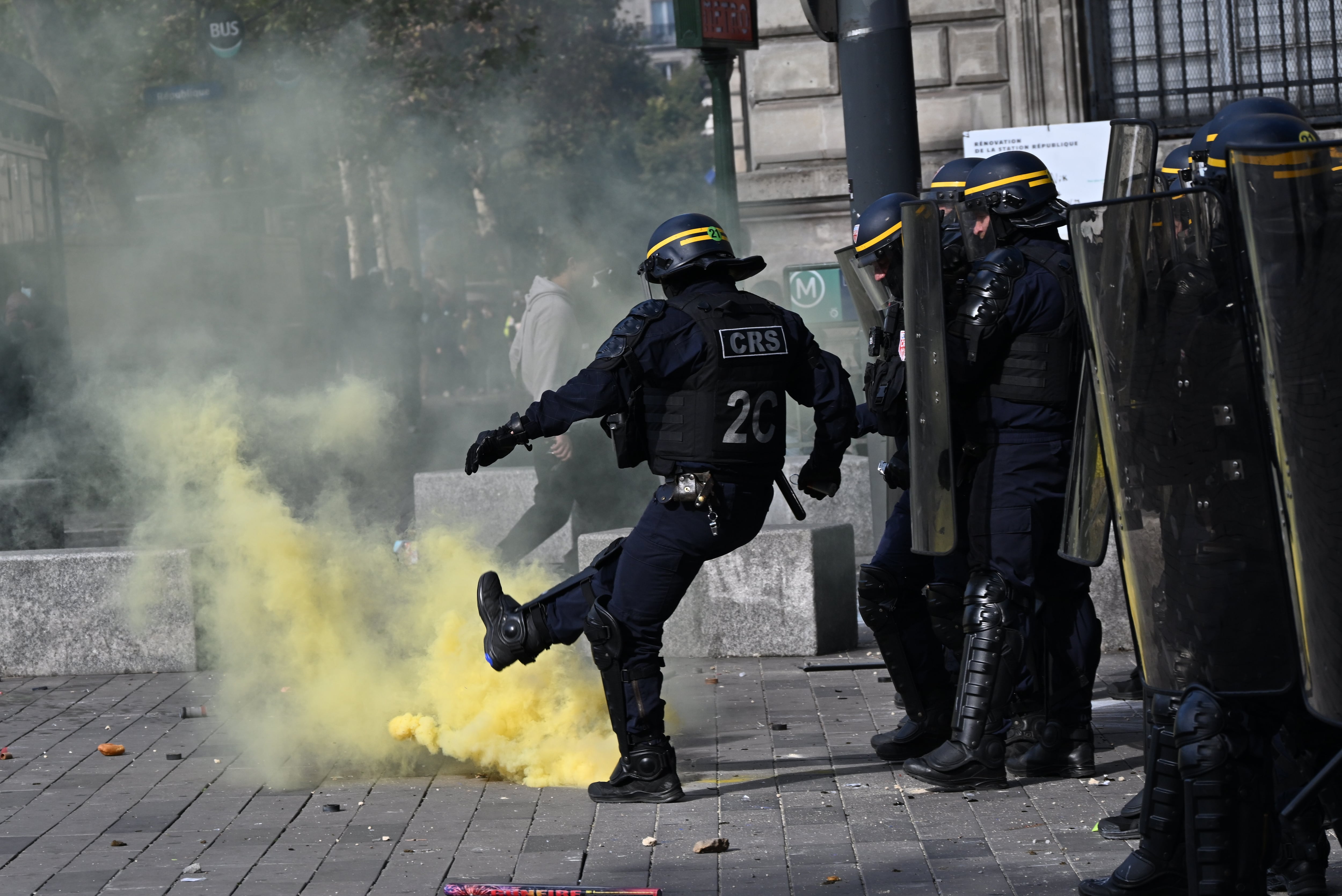 Scuffles and fires break out as protesters rally across France, joining students