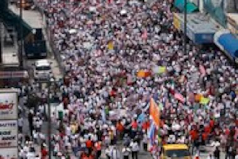 In Los Angeles, immigration-rights protesters march toward City Hall. Los Angeles County is home to about one million illegal immigrants, the largest concentration in the country.