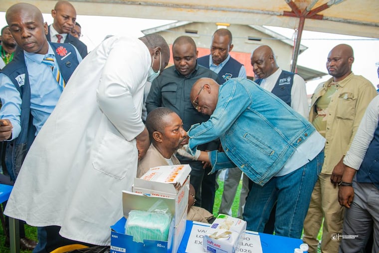 Congo’s Health Minister Roger Kamba administers an Ebola vaccine to a health care worker in Kisangani, Congo, Thursday, Aug. 27, 2026.