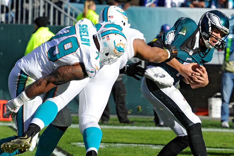 Sam Bradford gets sacked by Ndamukong Suh.