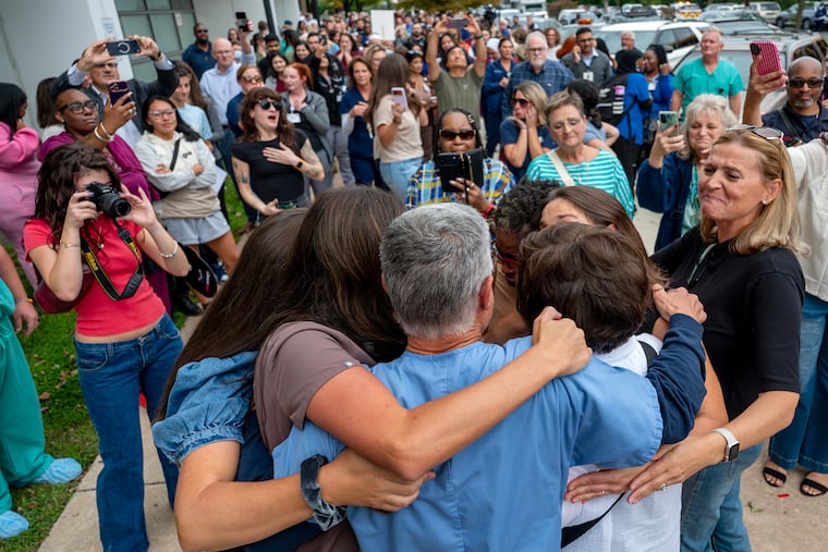 Al Sacchetti is surrounded by other physicians, nurses, hospital staff, friends, former colleagues, and patients as he finishes his final shift.