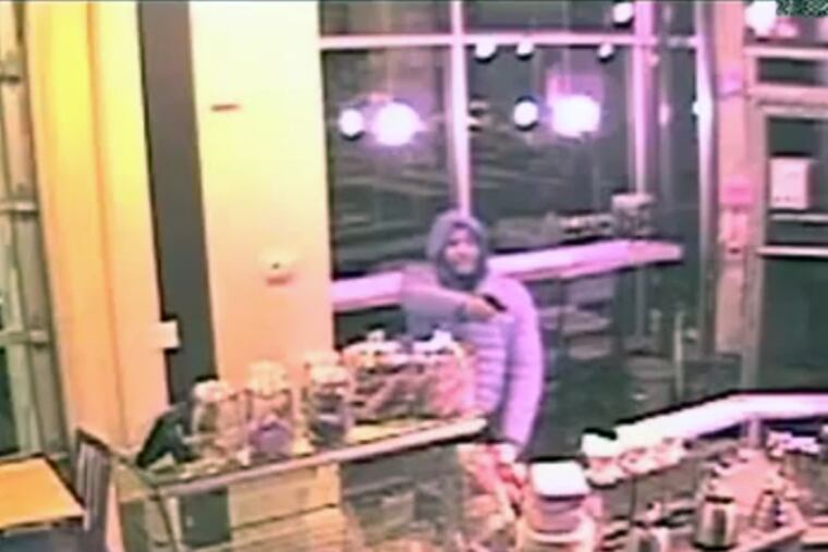Police are looking for a man caught on camera Jan. 18 robbing Ultimo Coffee Bar in South Philadelphia.