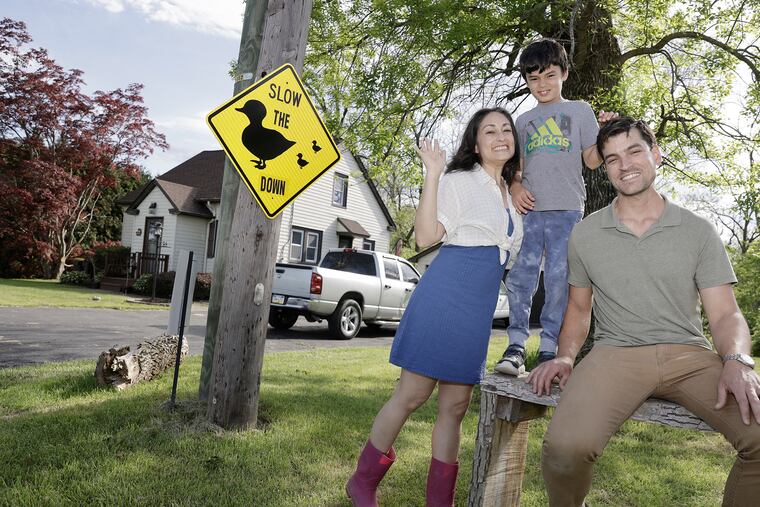 During the pandemic, Heidi, Gus, 7, and Miles Roux moved to a Cape Cod in Doylestown, where they now are raising three ducks. Miles Roux made both the sign and the bench.