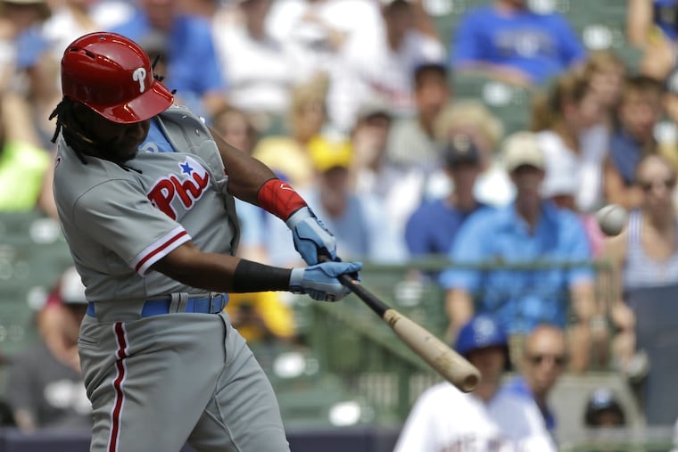 Maikel Franco hits a two-run home run during the fourth inning of the Phillies' 10-9 win over the Brewers in Milwaukee on Sunday.