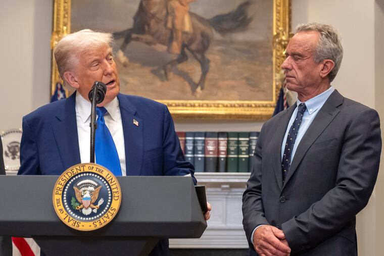 President Donald Trump speaks alongside Health and Human Services Secretary Robert F. Kennedy Jr. at the White House in May.