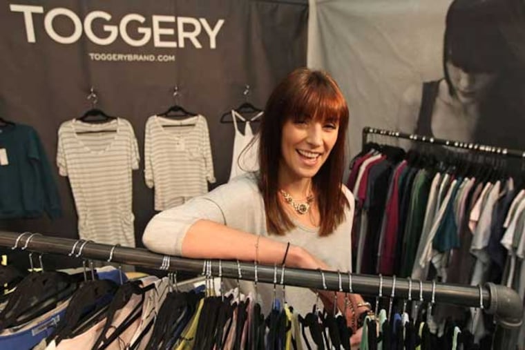 Kate D'Arcy and her Toggery collection on display at the Coterie trade show at the Piers in New York. It's designed and manufactured locally.
