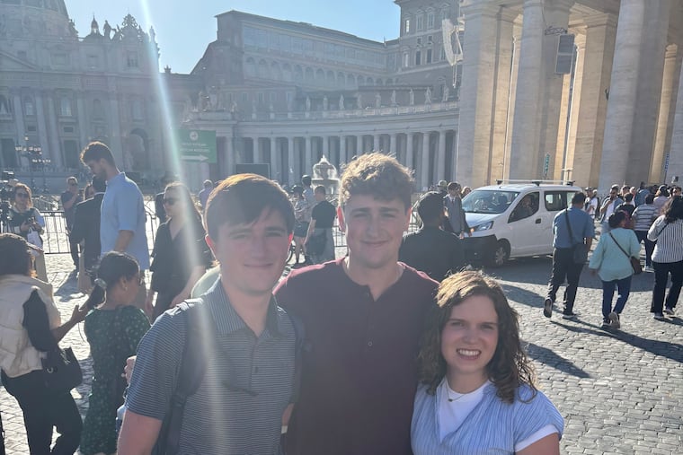 Villanova University interns George Small (left), James Haupt and Caroline Pirtle the day before the conclave, on St. Peter’s square in Rome.