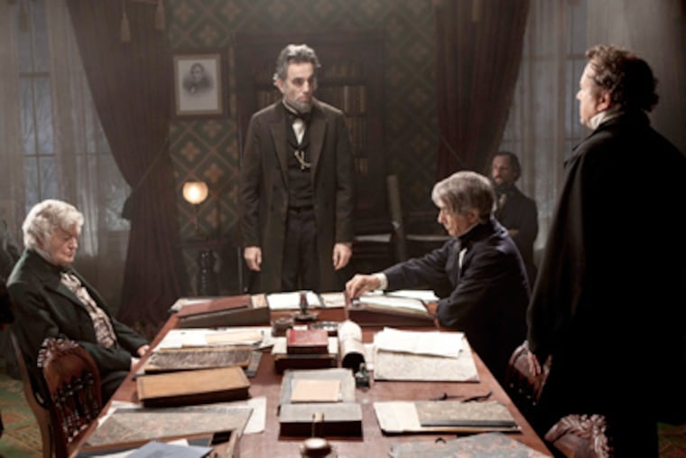 FILE - This undated publicity photo released by DreamWorks and Twentieth Century Fox shows, Daniel Day-Lewis, center rear, as Abraham Lincoln, in a scene from the film, "Lincoln." (AP Photo/DreamWorks, Twentieth Century Fox, David James, File)