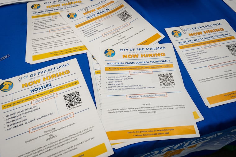 Informational flyers at a job fair in Philadelphia in 2023.
