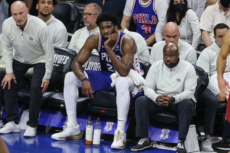 The Sixers' Joel Embiid waiting for Game 6 vs. the Heat to end.
