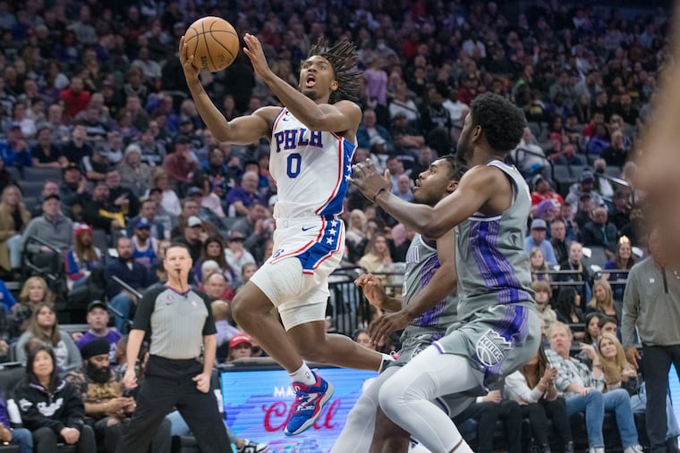 Sixers guard Tyrese Maxey (0) drives to the basket in the first quarter. Maxey finished with a game-high 32 points.