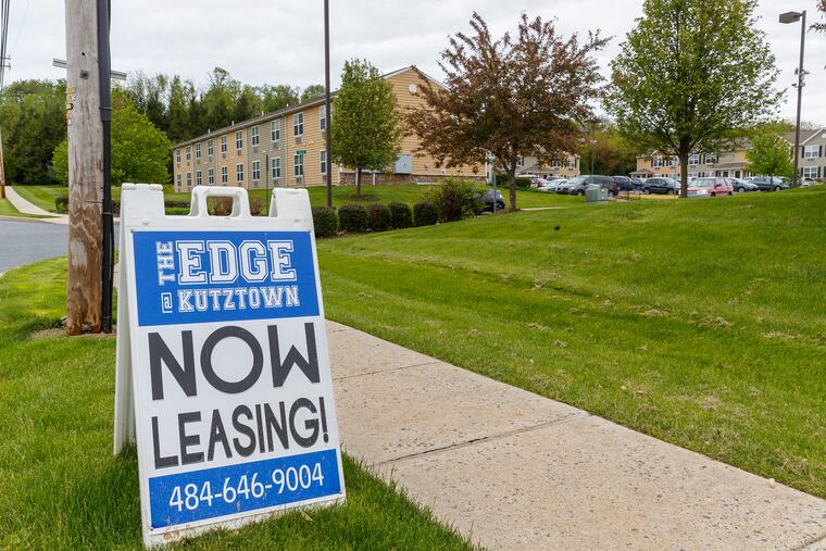 A “now leasing” sign sits out front of the Edge, a group of student apartments in Kutztown that has fallen into foreclosure as nearby Kutztown University loses students.