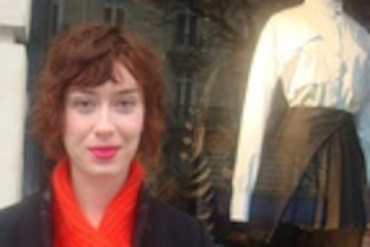 Megan Stein of Bala Cynwyd in frontof the Givenchy boutique in Paris.She recently quit an internship at the fashion house to make her own way.