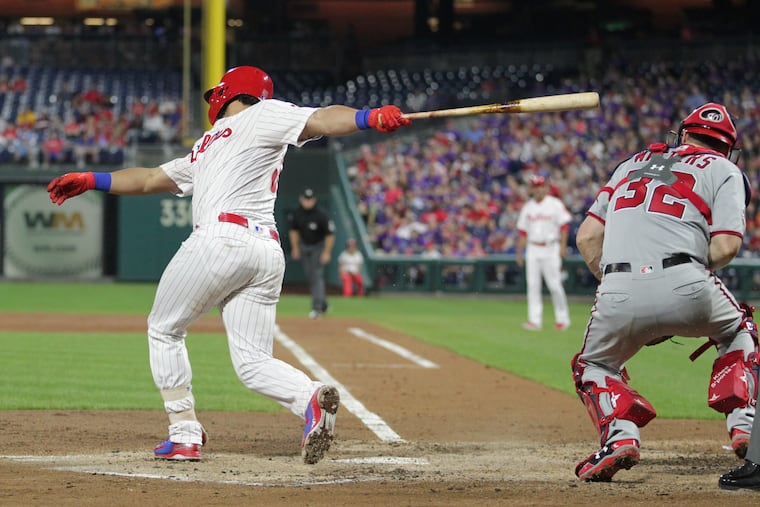 Jorge Alfaro strikes out against the Nationals on Wednesday. The Phillies are aiming for extra-base hits, and they don't plan to change their approach in the stretch.