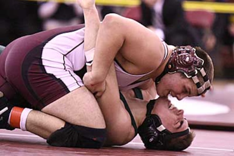 Matt Idelson pinned Methacton's Brendan Clark to advance to the PIAA Class AAA Southeast Region finals. (Lou Rabito/Staff File Photo)