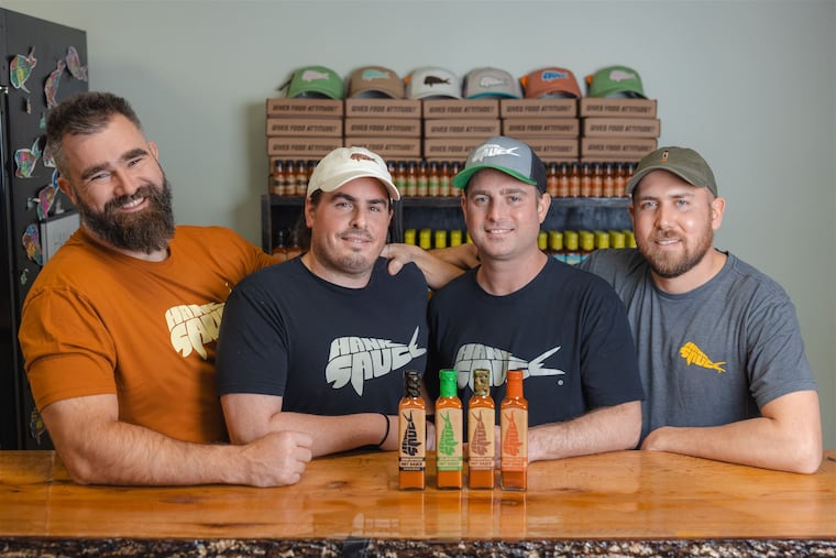 Jason Kelce with the co founders of Hank Sauce: from left,  Matt Pittaluga, Brian "Hank" Ruxton, and Josh Jaspan. Hank Sauce was founded in 2011 and is based in Sea Isle City. Kelce announced a partnership with the local brand and his family's Winnie Capital.