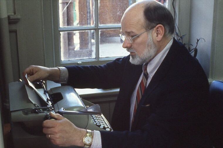 John Harkins seen at his desk at Germantown Friends School.