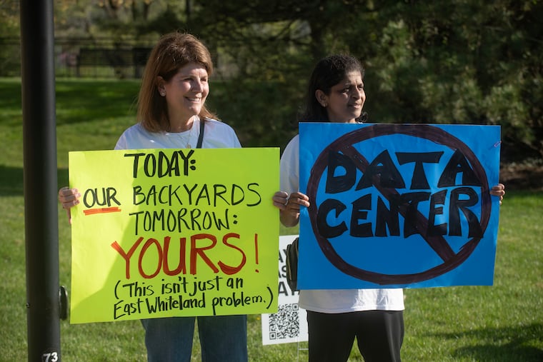 Community members Karen Fordyce and Namita Kapsi of Exton protest a data center that is set to be built in in East Whiteland.