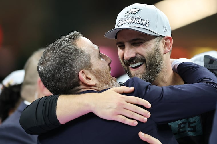 Eagles coach Nick Sirianni (right) celebrates with GM Howie Roseman after the team's victory over the Kansas City Chiefs in Super Bowl LIX on Feb. 9, 2025, in New Orleans.