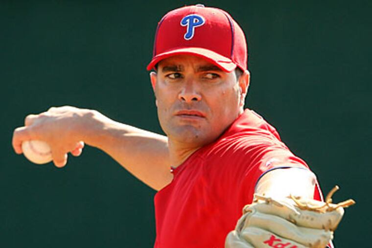 Danys Baez served as a translator for Jose Contreras, his close friend, last season. (Yong Kim/Staff Photographer)
