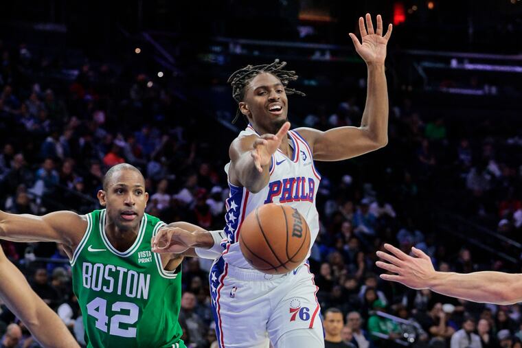 Sixers guard Tyrese Maxey lets the ball slip away as Boston's Al Horford guards him during the second quarter at the Wells Fargo Center.