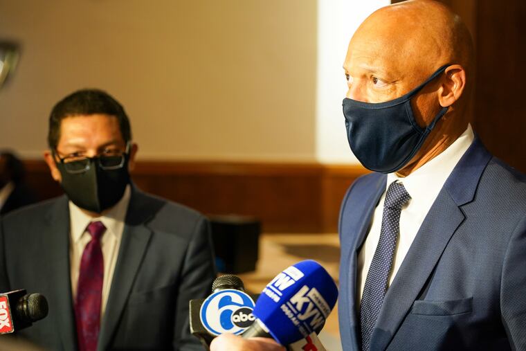 Pennsylvania Education Secretary Noe Ortega (left) with Superintendent William Hite at Robert E. Lamberton Elementary School in Woodbine, Pa., on Tuesday. Ortega toured the school and then met with Superintendent William Hite.