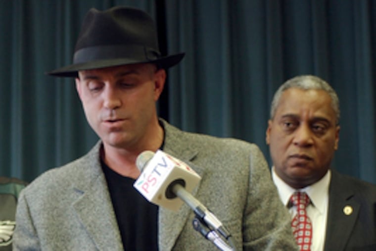 Philanthropist, crime fighter and egg-products millionaire Joe Mammana, seen here offering reward at 2004 news conference.