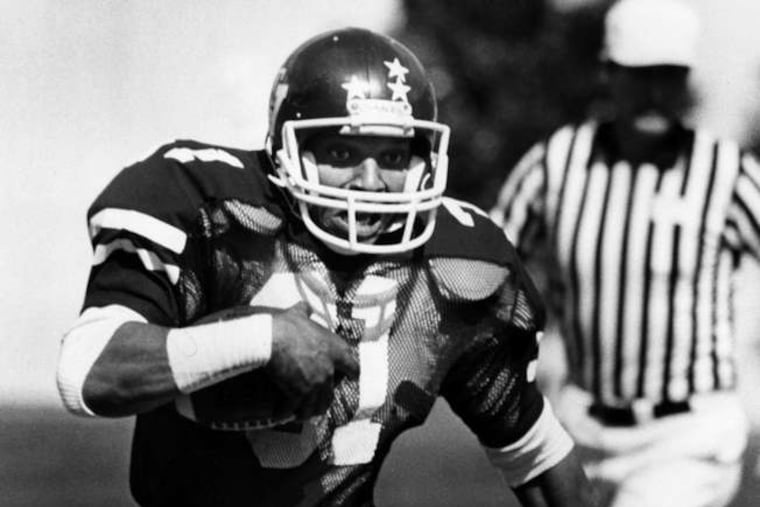 Billy Hite, as he was known back then, carrying the ballin a Virginia Tech football game.