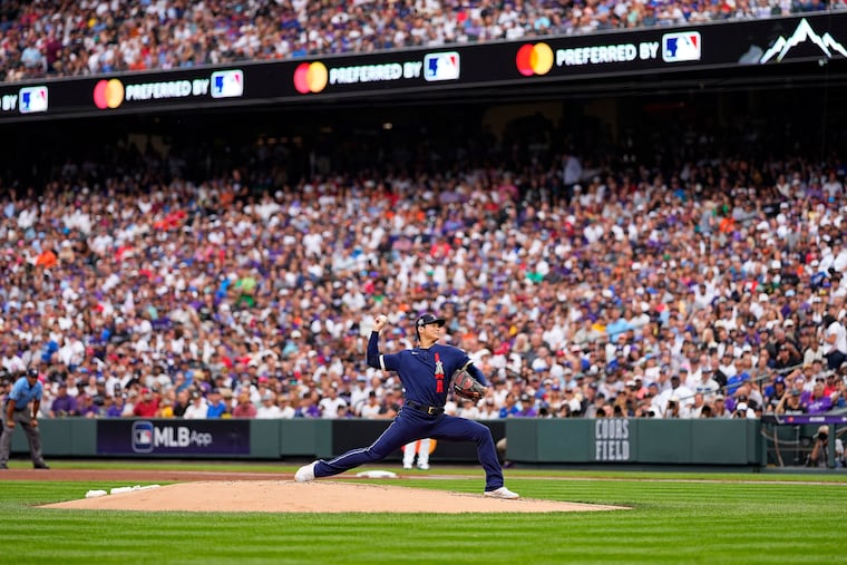 American League starter Shohei Ohtani throws during the first inning of the All-Star Game Denver.