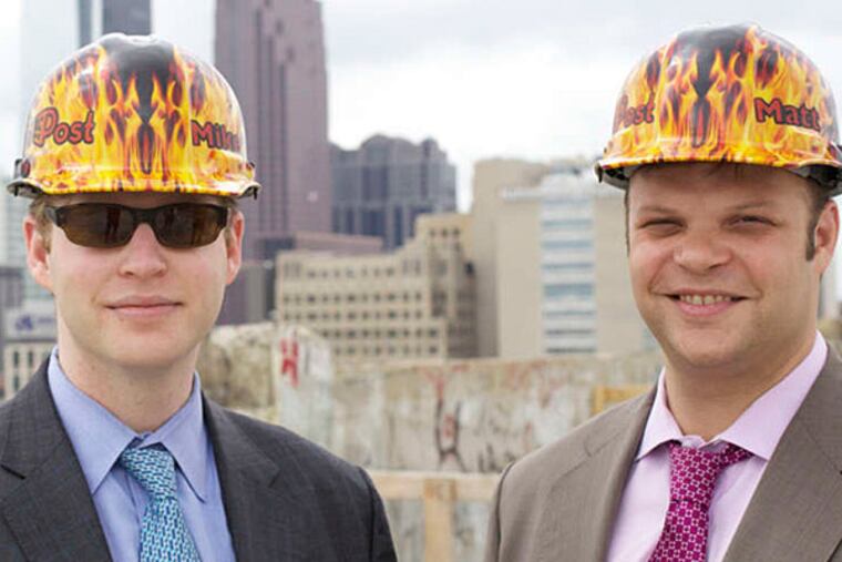 Developers Michael (left) and Matthew Pestronk have employed a combination of union and nonunion labor on the job. (Photo by Peter Woodall, courtesy of Hidden City Daily)