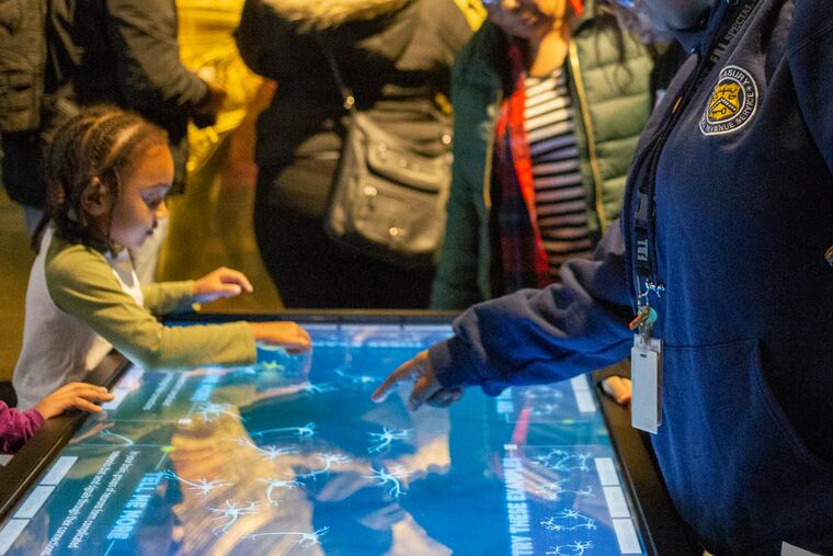 A family of a furloughed government worker visits the Franklin Institute Saturday for free, a benefit offered federal employees impacted by what is now the longest shutdown in history.