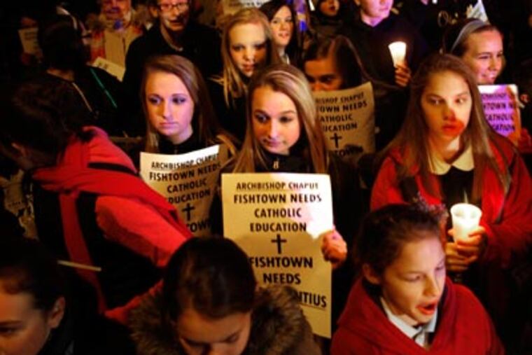 Students from St Laurentius School march in support of the Fishtown school. It is on the Archdiocese of Philadelphia's closure list. (LAURENCE KESTERSON / Staff Photographer)