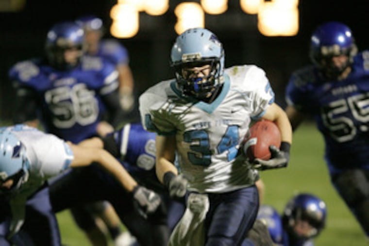 North Penn running back Tyler Smith is well ahead of the pack as he races for a touchdown. With its victory, Central Bucks South took the Suburban One League National Conference title.