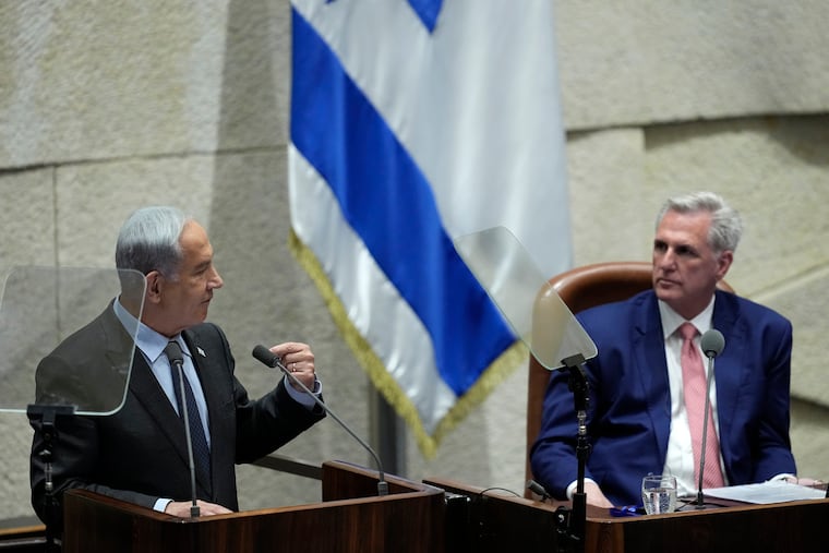 Israeli Prime Minister Benjamin Netanyahu (left) speaks as U.S. Speaker of the House Kevin McCarthy listens during a session of the Knesset, Israel's parliament, in Jerusalem on Monday.