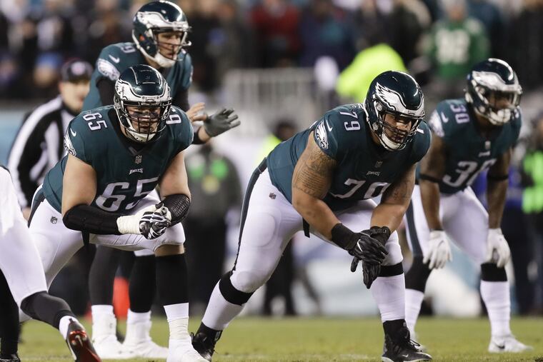 Eagles offensive linemen Lane Johnson and Brandon Brooks against the Atlanta Falcons in a NFC Divisional Playoff game on Saturday, January 13, 2018 in Philadelphia. YONG KIM / Staff Photographer