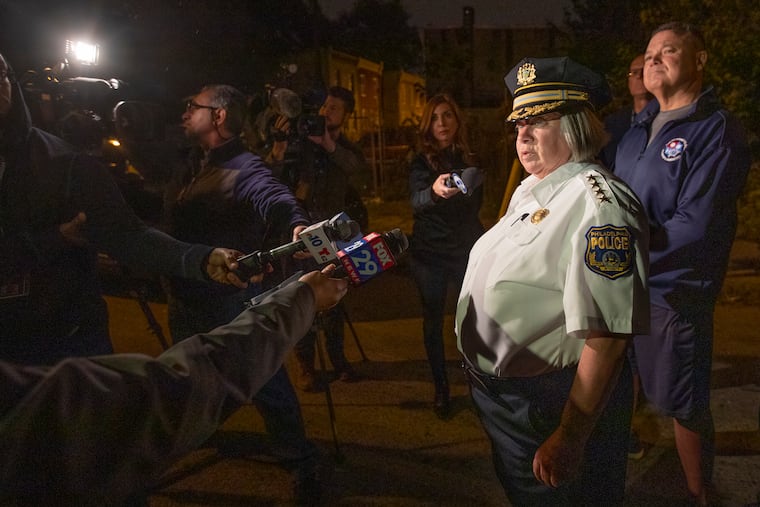 Acting Philadelphia Police Commissioner Christine Coulter, center, addresses reporters after six people were shot near the intersection of 8th and Clearfield Streets in North Philadelphia. All six were being treated at Temple University Hospital.