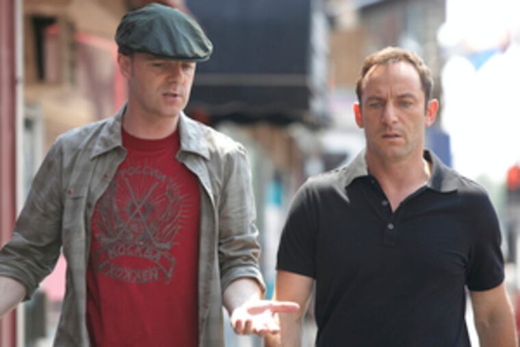 Brian O'Byrne (left) and Jason Isaacs in an episode of "Brotherhood."