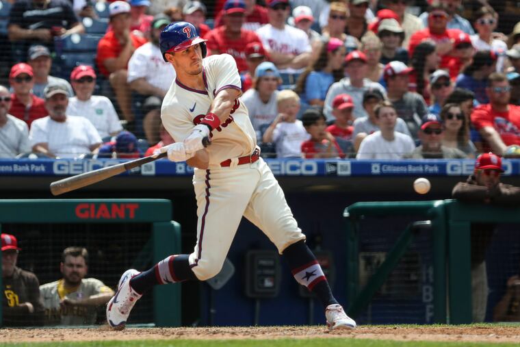 Phillies catcher J.T. Realmuto hits a home run against the San Diego Padres on July 4.
