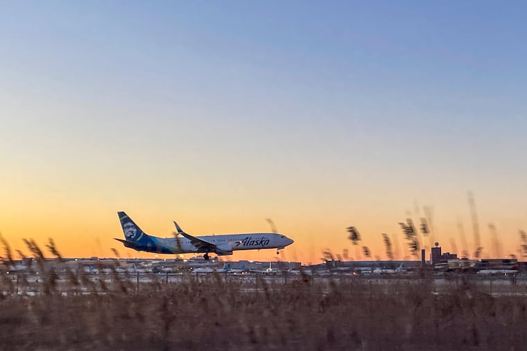 An airplane lands at Newark Liberty International Airport.