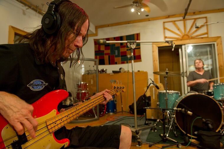 The Hooters founding drummer David Uosikkinen (background, right) along with bass player Buddy Cash continues his "In the Pocket" project that assembles iconic Philly rockers to play and videotape iconic Philly rock hits.