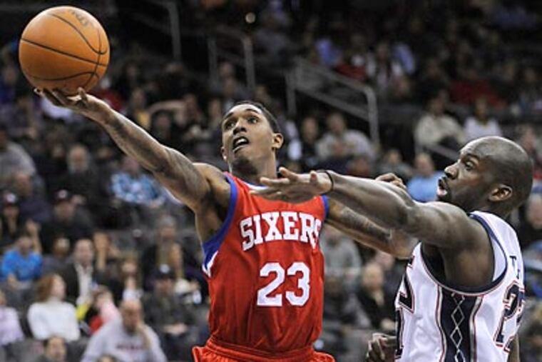 Lou Williams led the Sixers with 26 points. (Bill Kostroun/AP)