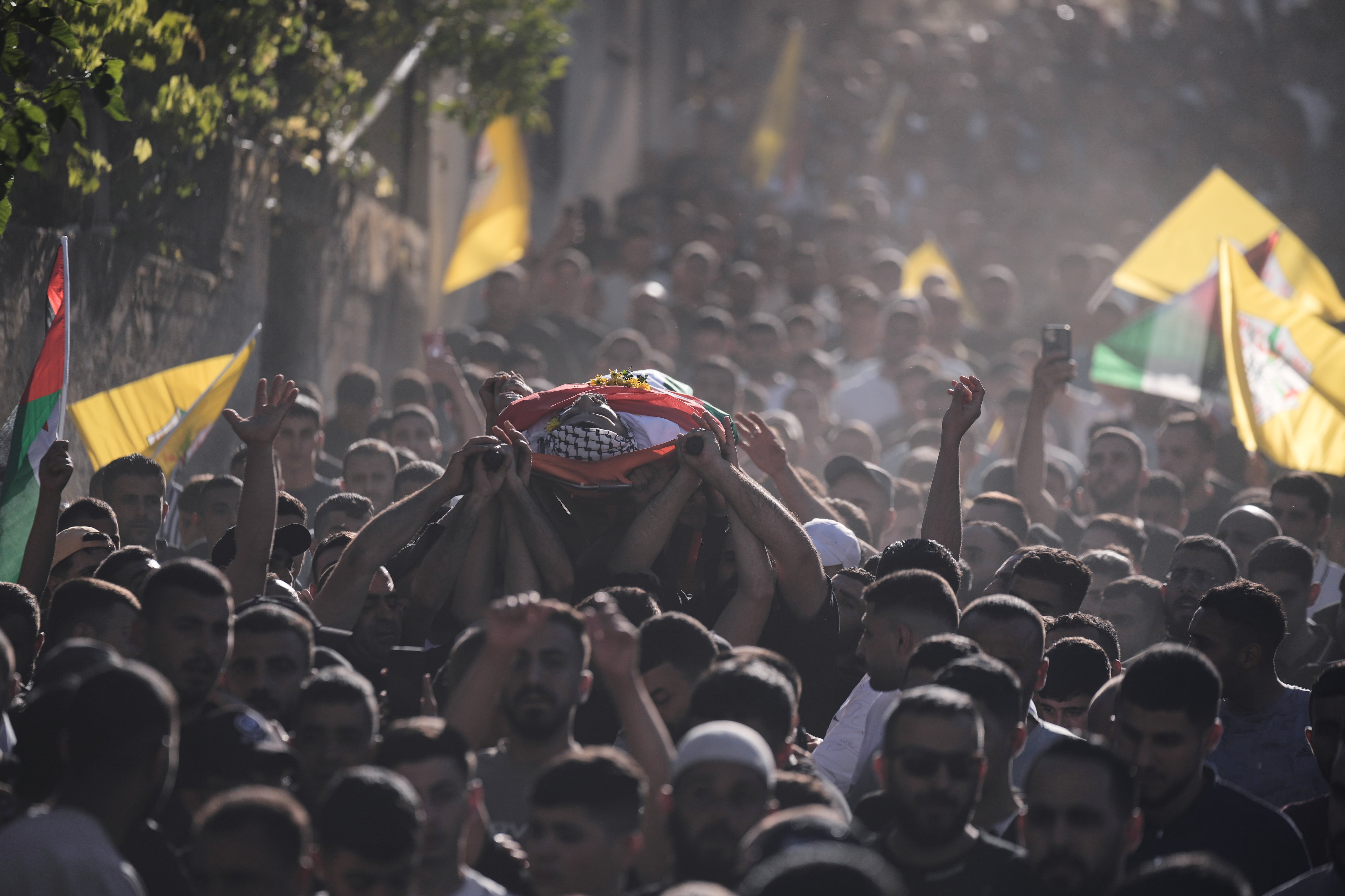 Palestinian man is shot and killed at a West Bank barrier near Jerusalem
