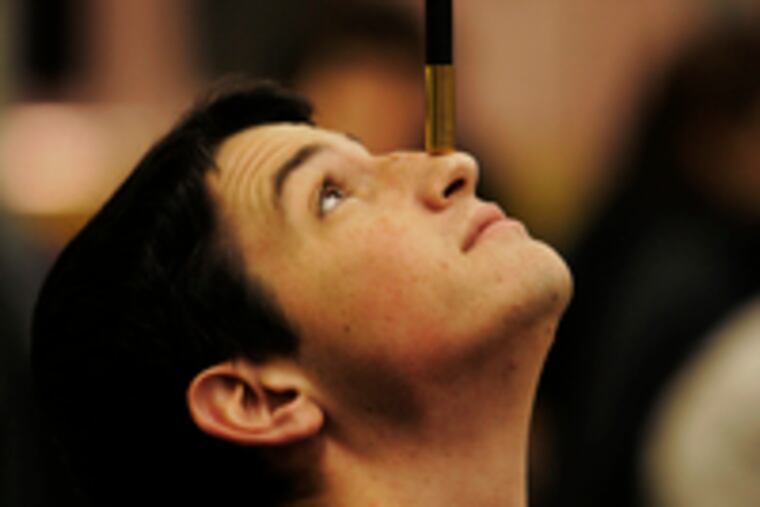 Balancing act: Juros performs in Wynnewood. Magic "took his mind off all the negative going on in his life," his magician mentor says. "It gave him the drive." His father would entertain him with magic during hours of chemo.