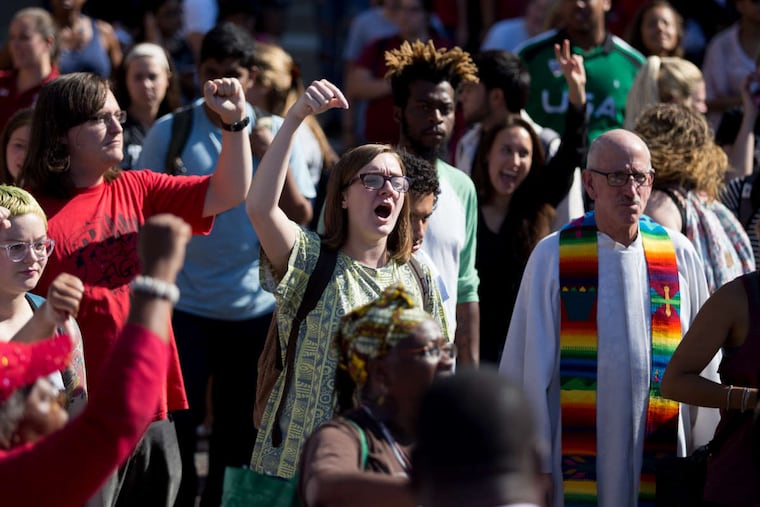 Becky Cave protests the building of a football stadium on Temple's campus last year.