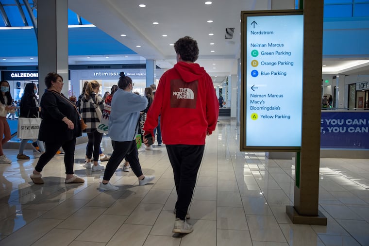 Shoppers walking through the King of Prussia Mall on Black Friday, Nov. 26, 2021.