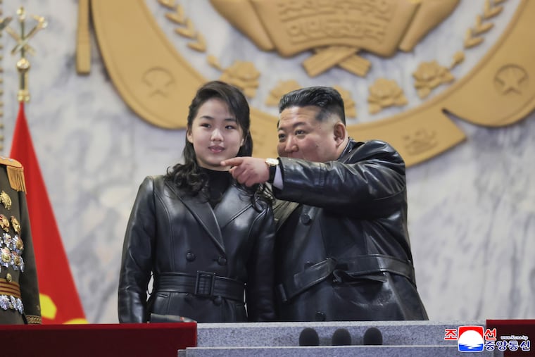 FILE - In this photo provided by the North Korean government, its leader Kim Jong Un attends a parade with his daughter in Pyongyang, North Korea, on Feb. 25, 2026 as the North wrapped up the Workers' Party congress. Independent journalists were not given access to cover the event depicted in this image distributed by the North Korean government. The content of this image is as provided and cannot be independently verified. Korean language watermark on image as provided by source reads: "KCNA" which is the abbreviation for Korean Central News Agency.
