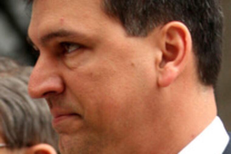 State Sen. Robert Regola remains free on unsecured bond. He is accused of improperly storing the gun, and lying about it later.