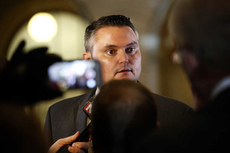 State Rep. Nick Miccarelli talks with the media after a hearing at the Luzerne County Court House in Wilkes-Barre on Thursday, March 15, 2018.