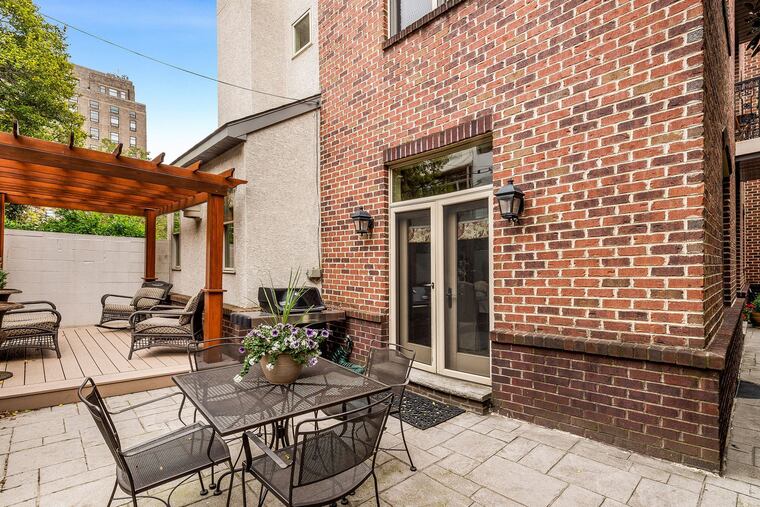 The large brick contemporary home in the neighborhood also known as Southwest Center City had land on three sides.