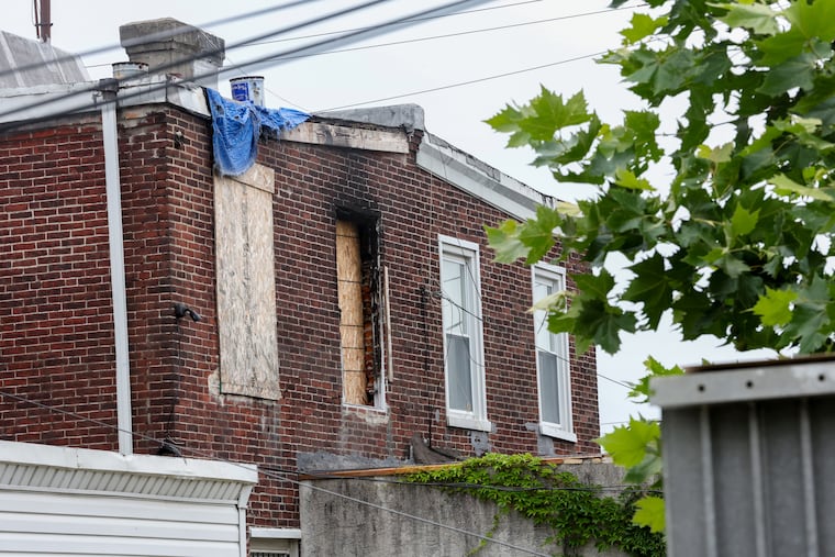 The home where Eugene Horsch lived was decrepit and appeared to show damage from a fire in the back windows.